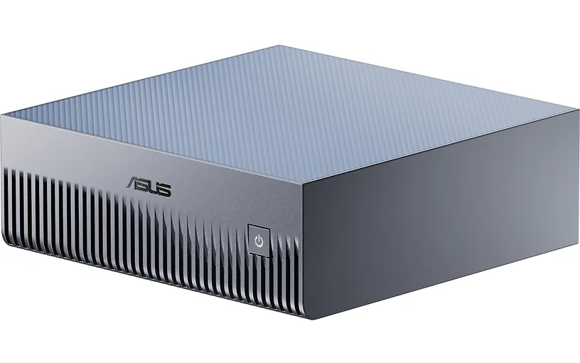 Asus GX10-GX10-GG0003BN EU on kompakti harmaa mini-PC, teksturoitu kansi, pystyurat ja ASUS-logo. Moderni muotoilu toimistoihin. - Prisma-IT Web